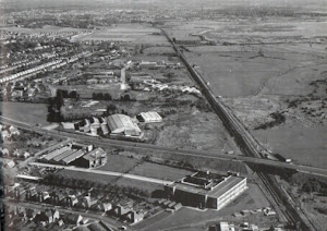 The railway line passing under the Eastern Road and onto Farlington Marshes before the motorway