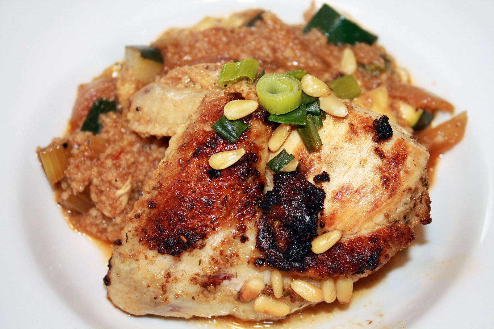 a day in the kitchen of... roasted garliccumin chicken over couscous