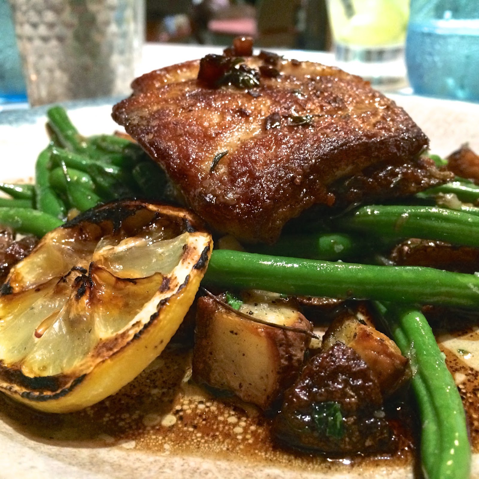 Fresh Gulf Red Snapper served with Red Potatoes, Sautéed Green Beans, Grilled Lemon, and Brown Butter Vinaigrette