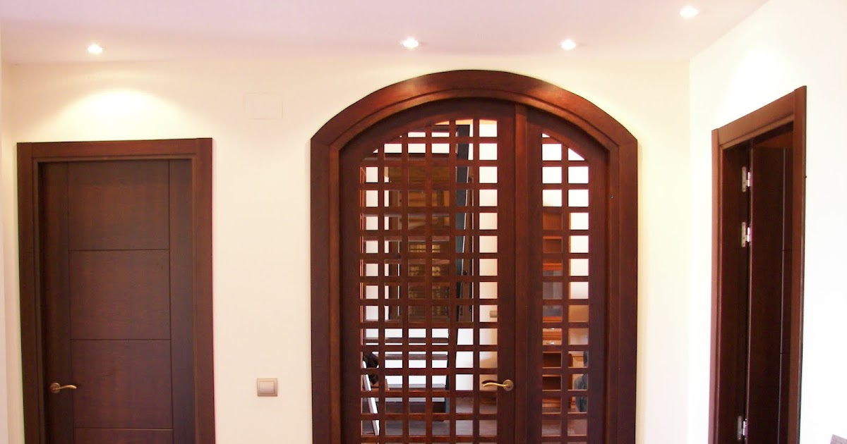 CARPINTERIA VIOSCA RODA: PUERTA EN ARCO CON CELOSIA