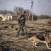 An Ukrainian soldier patrols territory near Debaltseve
