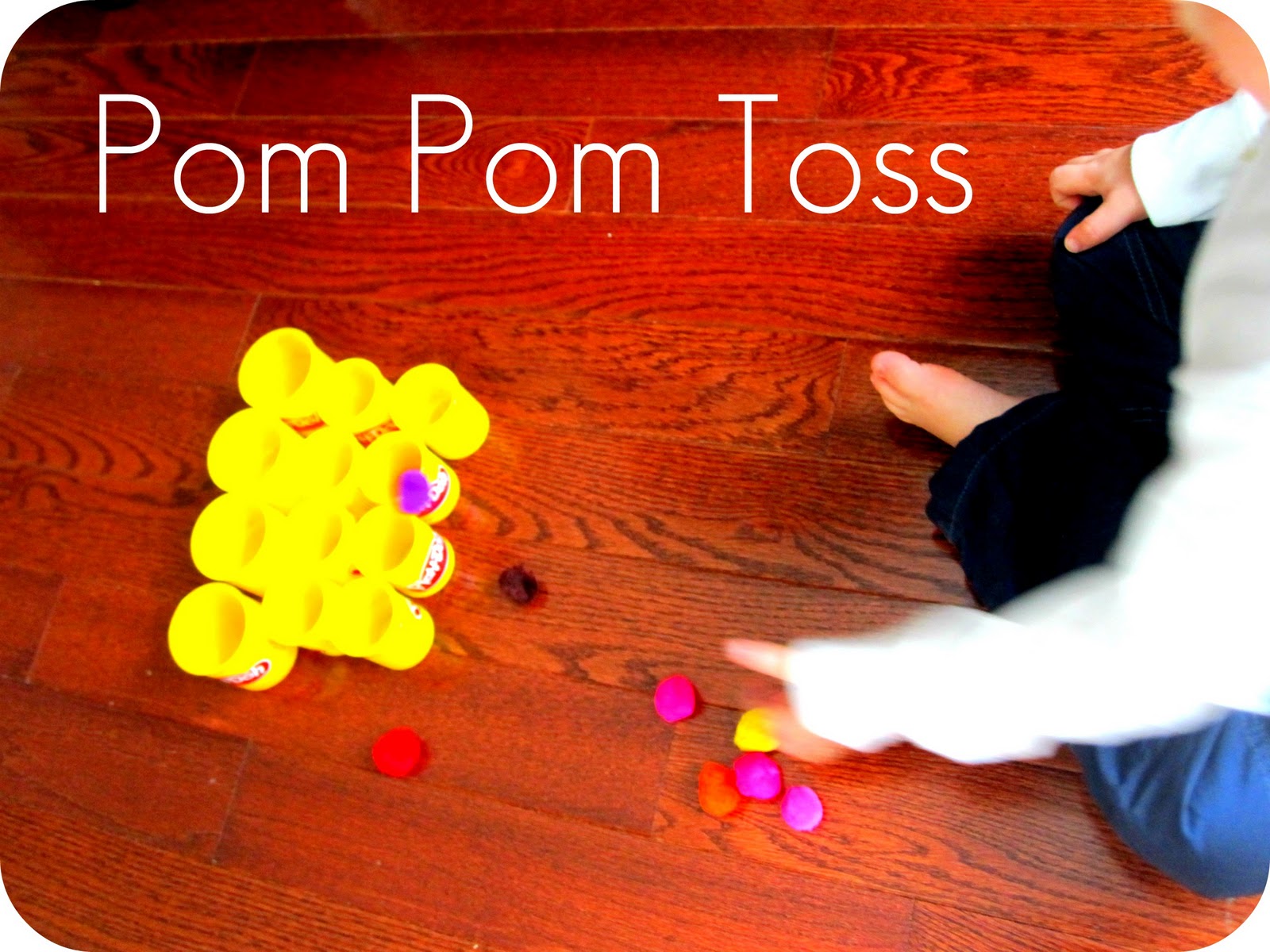 Toddler Approved! Pom Pom Toss