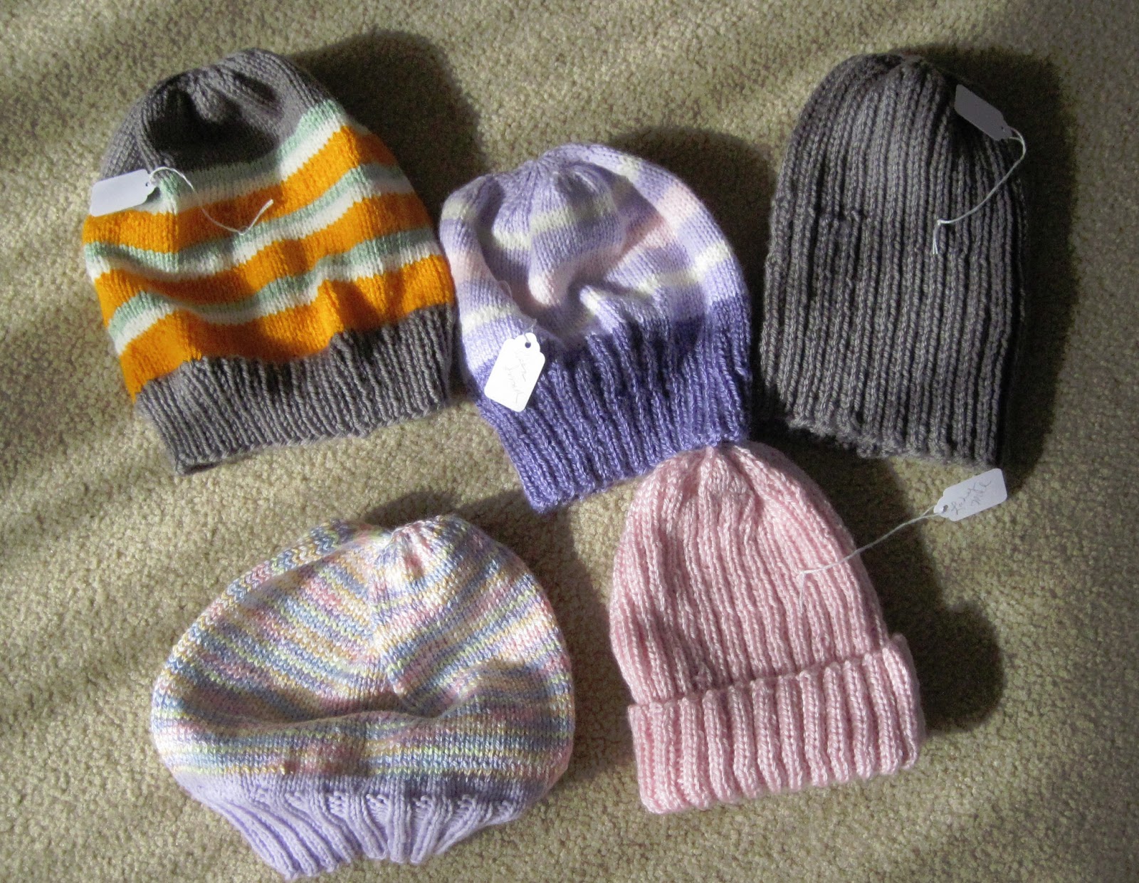 Bridge and Beyond Donating Knitted Hats for the Homeless