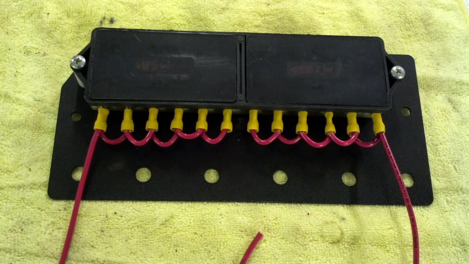 Richard Rodriguez warned me about poor grounding that he found during his conversion, so I cut the big, fraying, single-gang grounding bundle of brown wires ...