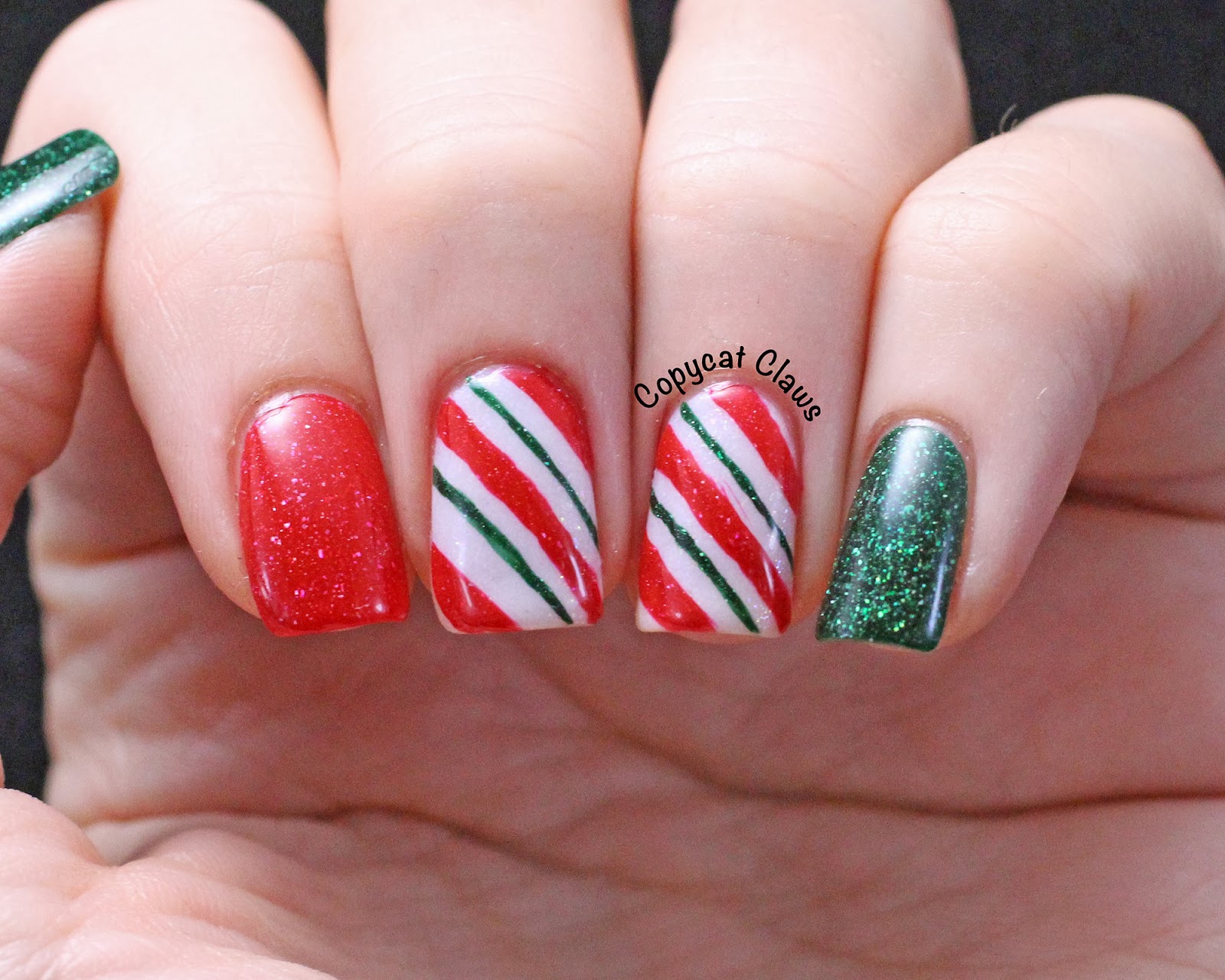 10. Candy Cane Solar Nail Designs for Christmas - wide 9