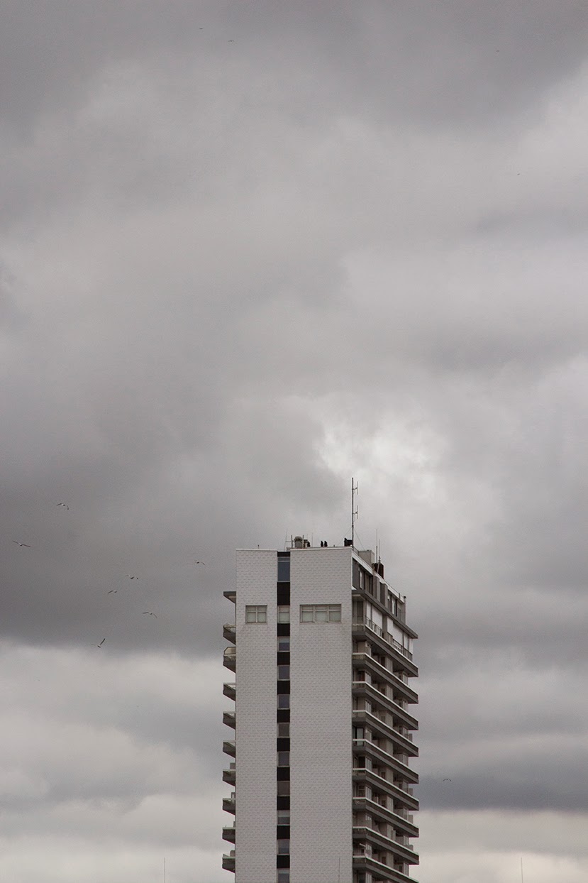 apartment building and grey sky