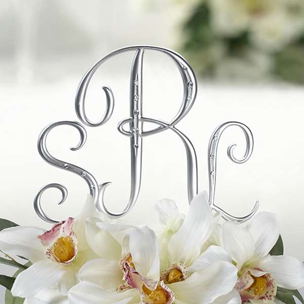Wedding cake toppers come in so many beautiful styles and designs 