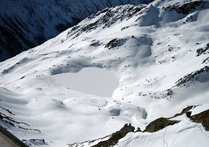 Frozen mountain lake in the Austrian Alps