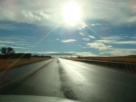 low sun, sun glare, sun dazzle on windscreen of car