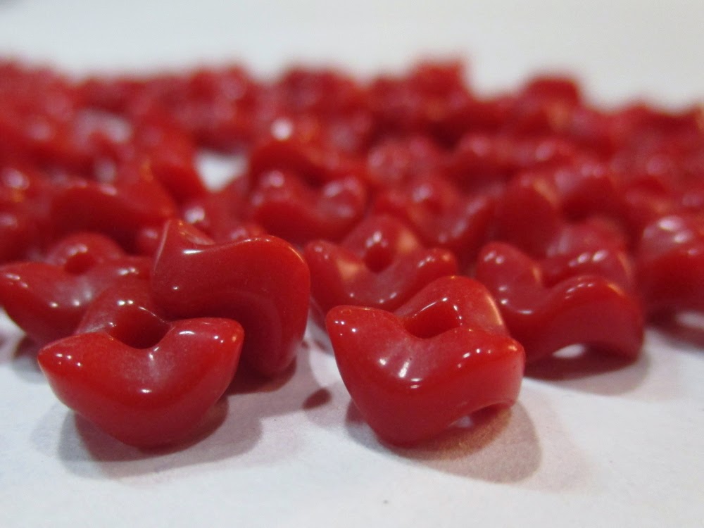Red vertebrae glass beads.