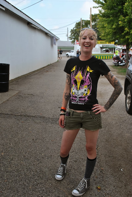photo by Tom Storm - Raivyn dK - Easyriders Rodeo 2013 Chillicothe OH - tattoos - Fuxleep t-shirt, Decree shorts, Hot Topic socks, Converse sneakers