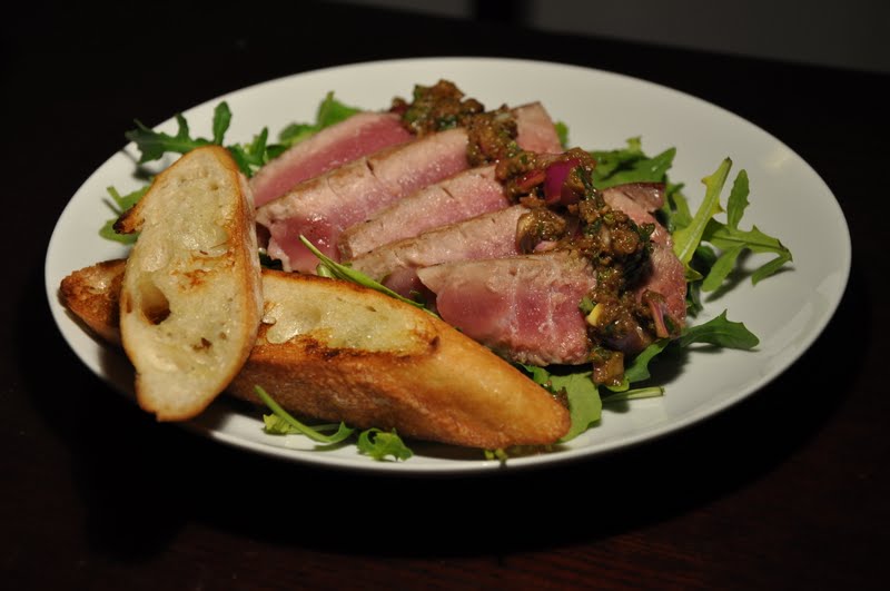 Slice of Rice Seared Tuna with Olive Tapenade Vinaigrette and Arugula