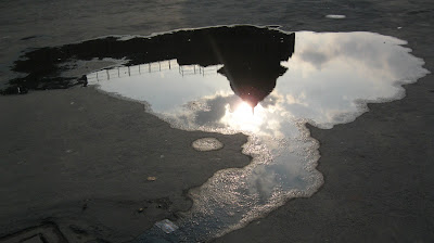 old delhi reflection in puddle