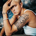 Tattoo do Eminem no braço