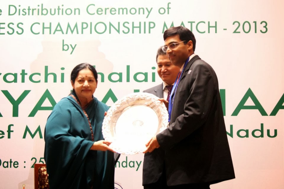 World chess champion Viswanathan Anand of India holds a trophy at an award  presentation ceremony of the FIDE World Chess Championship in Moscow,  Russia, Thursday, May 31, 2012. Anand oretained his title