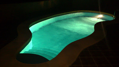 The pool lit up at night before John got in!