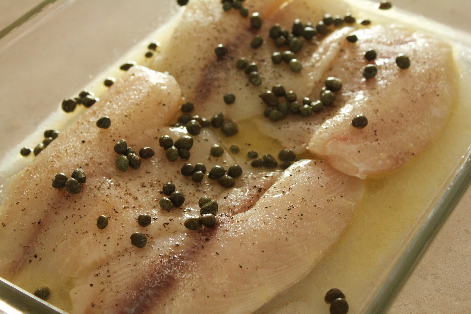Delicious as it Looks LemonButter Baked Tilapia with Capers