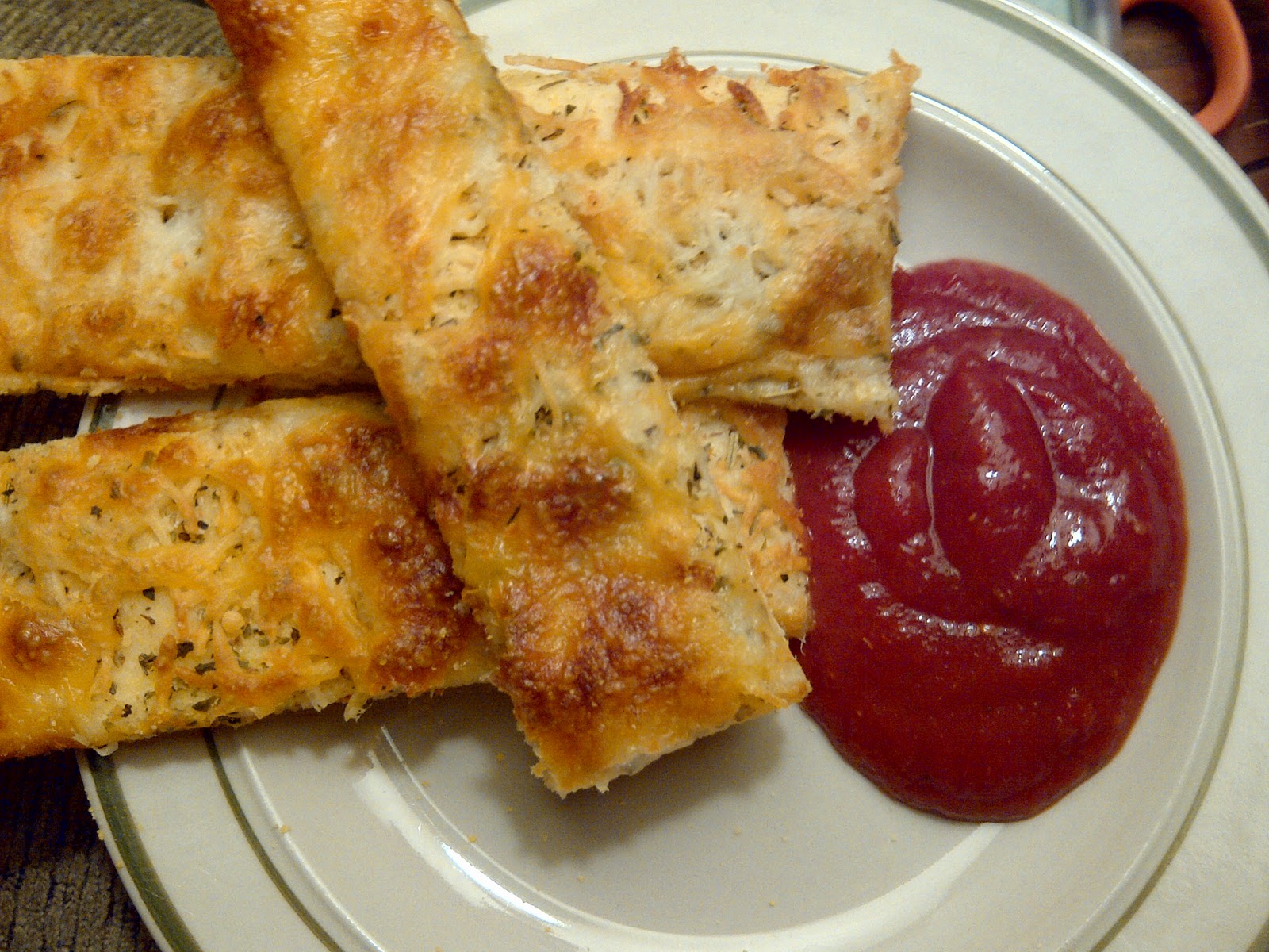 USASillyYaks Pizza Crust and cheese sticks........from scratch.
