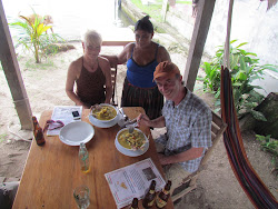 Canadians Mellta Swift (far left) and Chris Recek dining at Casa Nostra in Rio Dulce