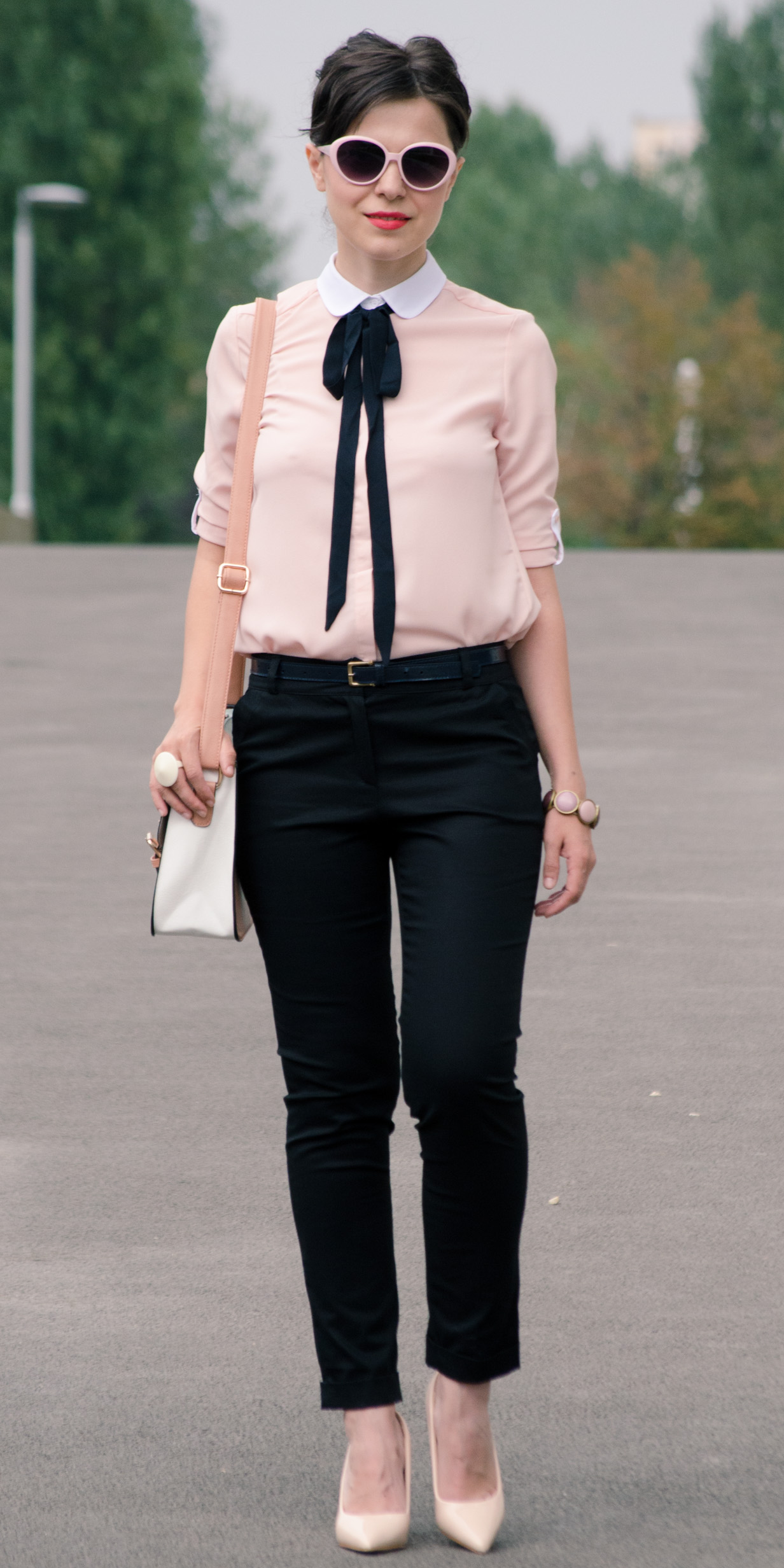 preppy back to school outfit black pants dusty pink shirt black bow pastels bag satchel nude heels