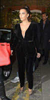 Kim Kardashian glamorous in a black outfit