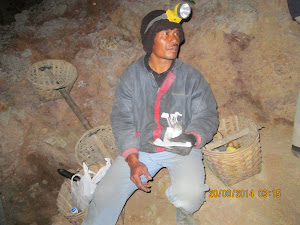 A Sulphur mine-worker selling "Sulphur  moulds" at "KAWAH IJEN" sulphur mine.