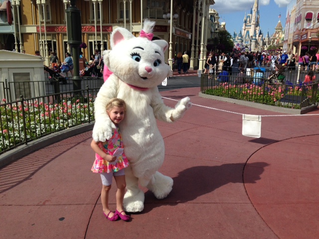 Happy Child with Kitty at Magic Kingdom