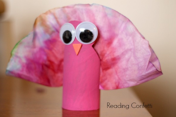 Thanksgiving turkey craft kids can make from a cardboard tube and coffee filter