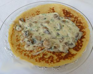 Recette des crêpes à la sauce béchamel au champignon au four