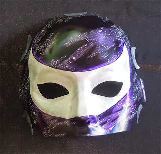 Not the usual mask of the Moon.  This mask has pearlescent properties which makes it glow.