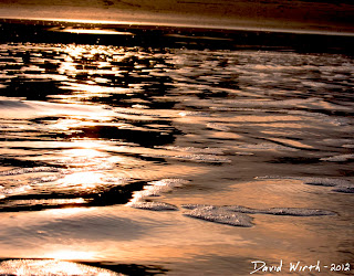 sunset at the ocean, golden sun reflection