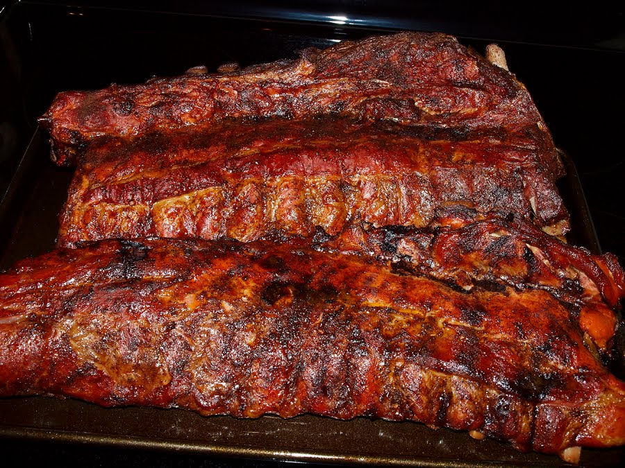 Pellet Smoker Cooking Pork Back Ribs in Parchment Paper