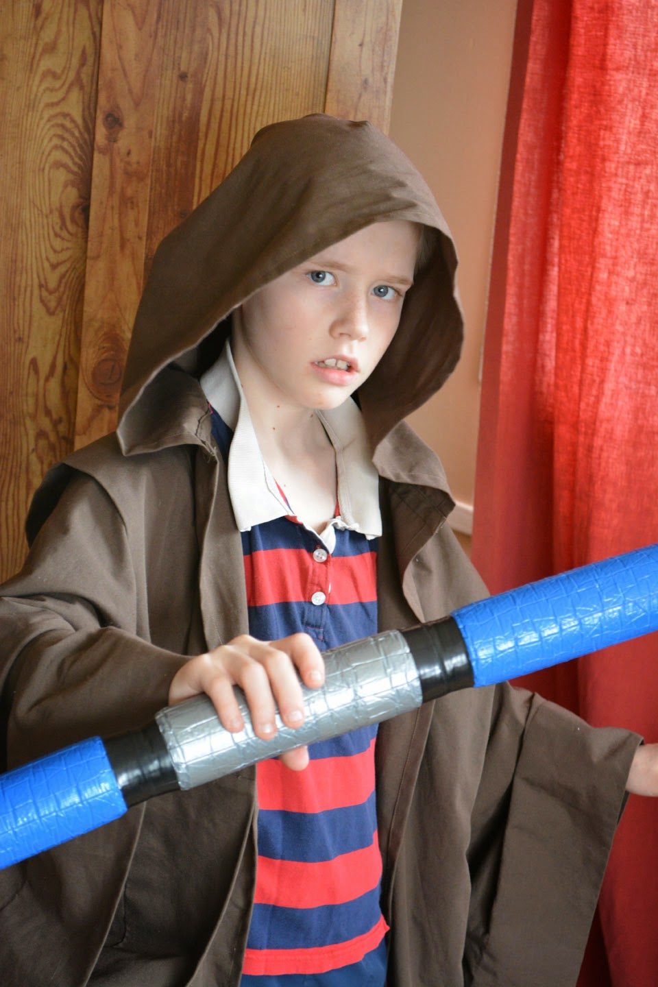 Jedi boy with light sabre