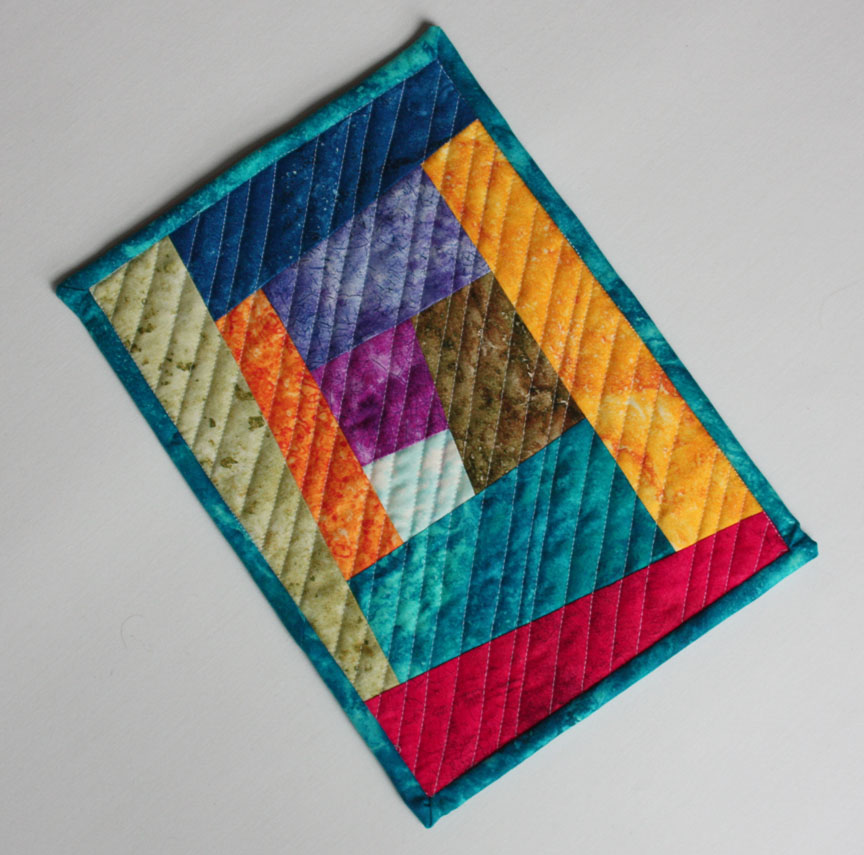 Inspired by Fabric Wonky Log Cabin Mug Rug Tutorial