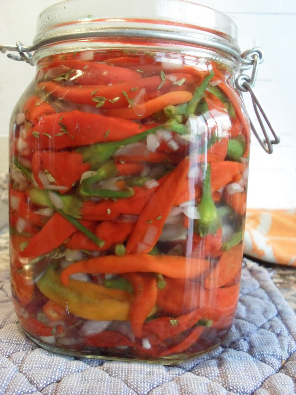 brightly coloured sunflowers Pickled red hot chilli peppers