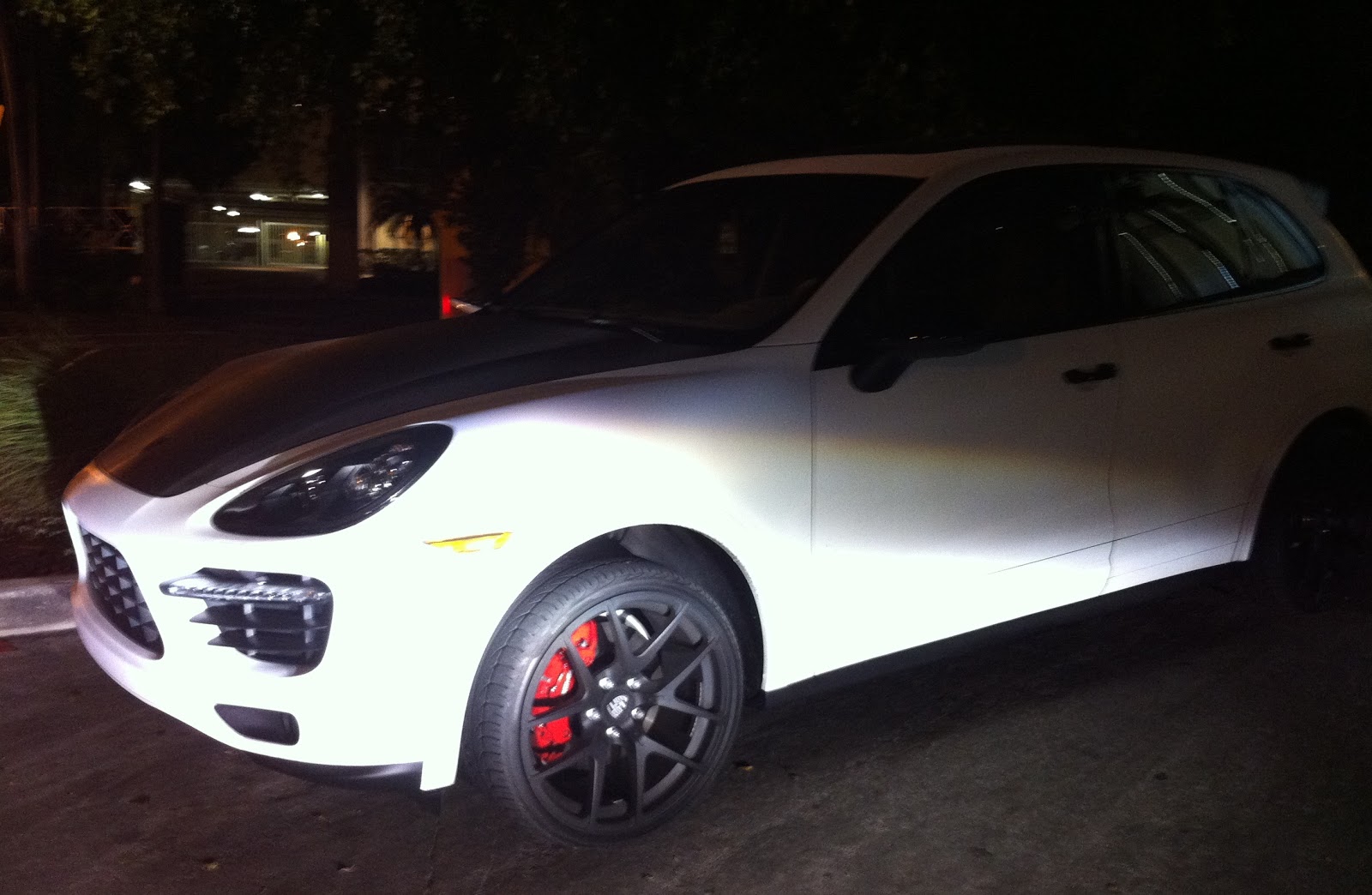 Matte White Porsche Cayenne with black carbon fibre hood Exotic Cars