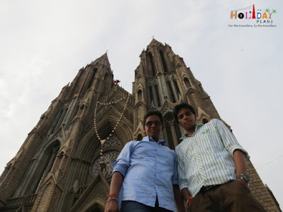 Gaurav and Ankit at the church !! twin spires of the st philomena's church
