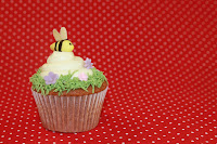 Honey and lemon cupcake topped with honey and lemon buttercream and a fondant bee