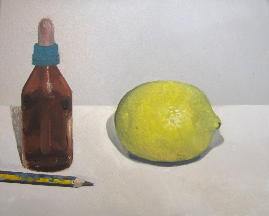 Gotero, lápiz y limón