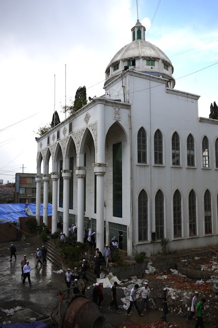 men and boys leaving mosque