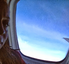 View of airplane window and wing