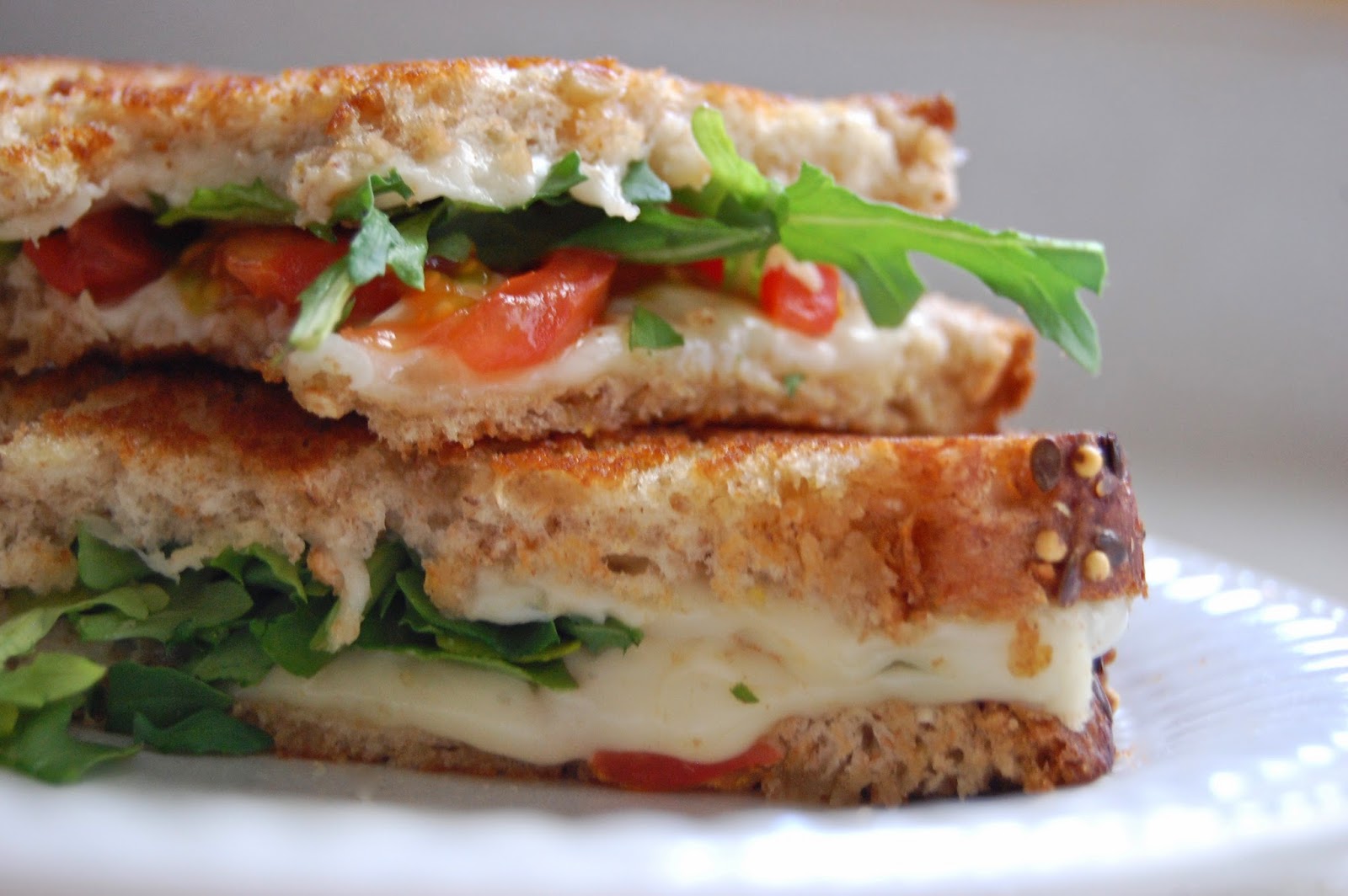 Poppi Linn Grilled CheeseJarlsberg, Mozzarella, Arugula, Tomato