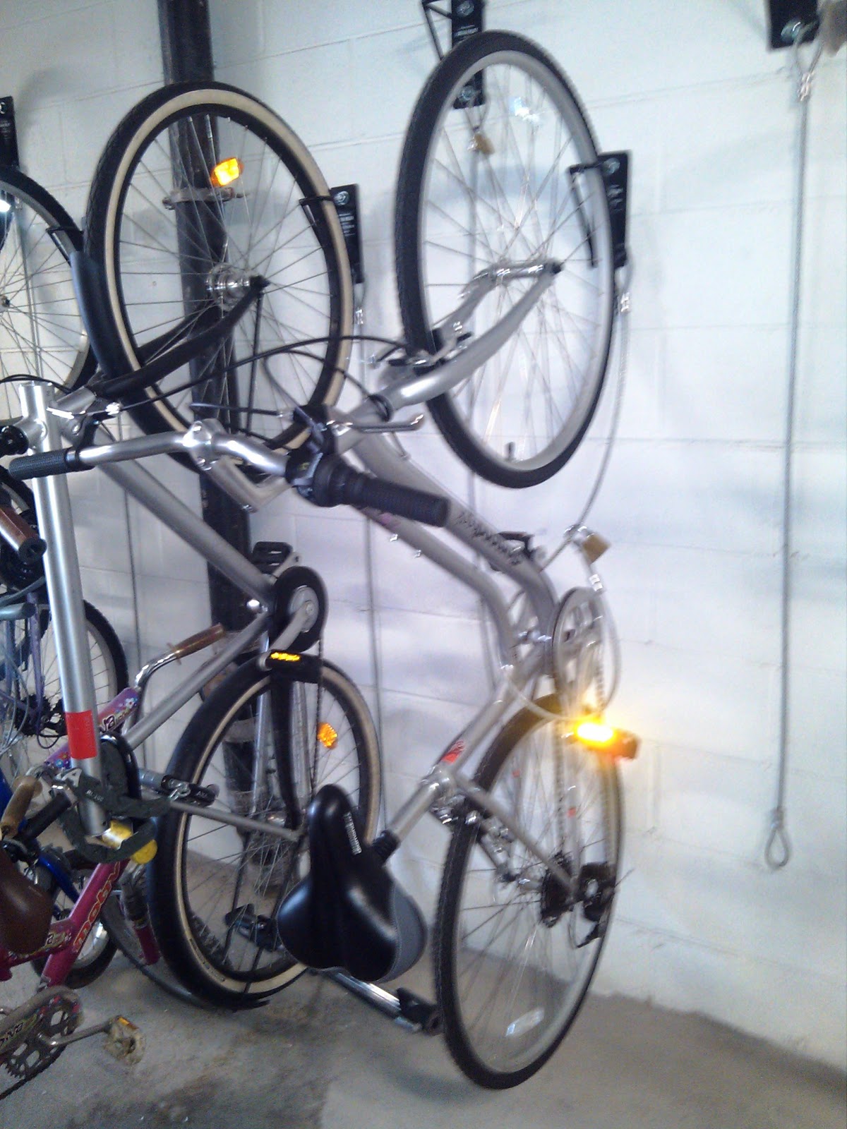 Wall Mount Bike Brackets create Space Efficient Bike Storage in Long