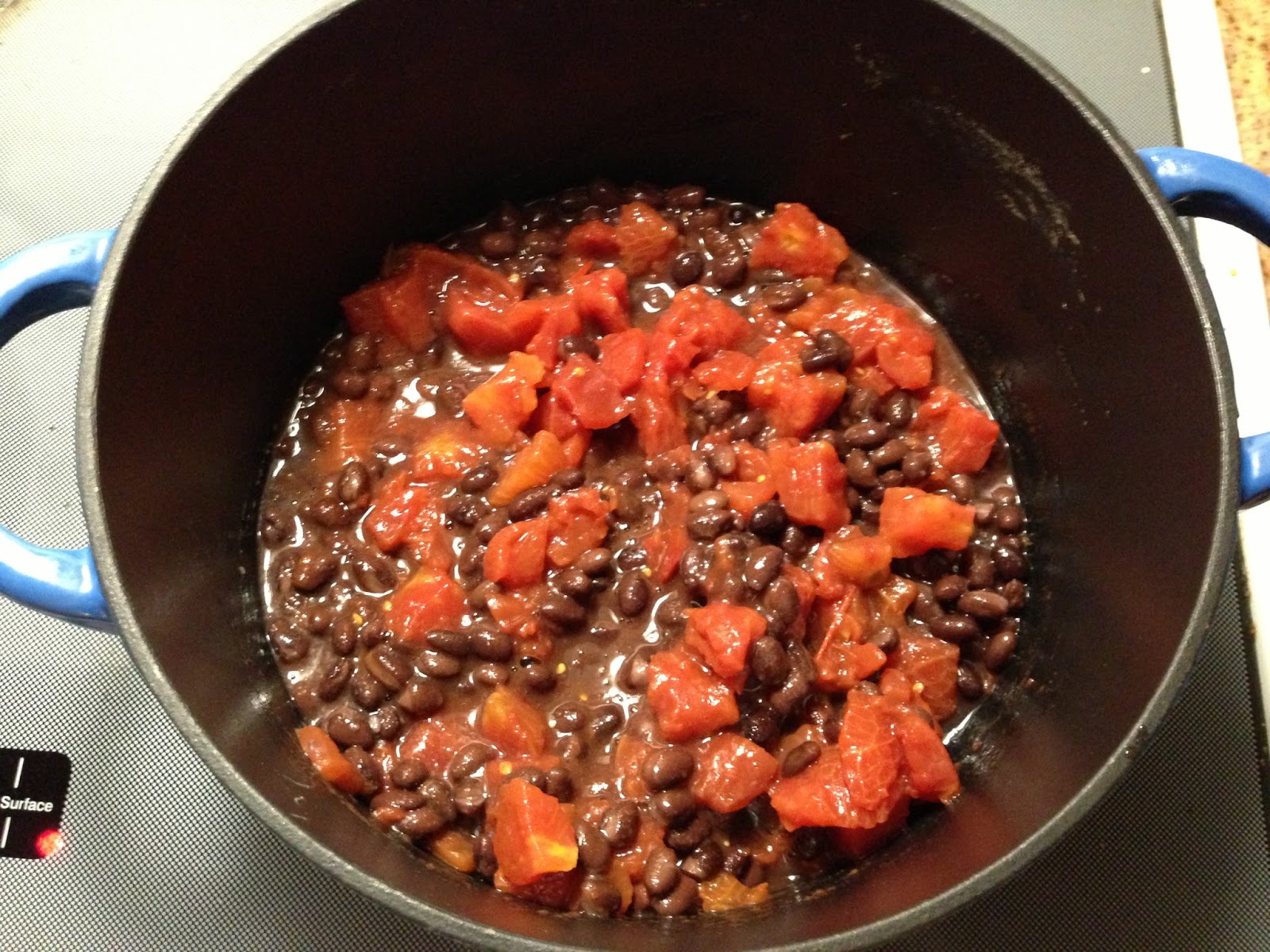An Ironman Cooks! Cooking Black beans w/ spinach, tomatoes, and