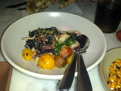 Squid Ink Tagliatelle and Octopus / blistered tomato / breadcrumb