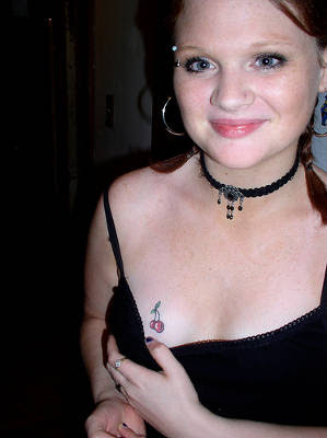 angelina jolie breast tattoos