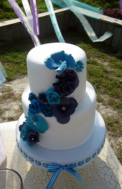 Blue Gumpaste Flowers A beautiful white wedding cake 
