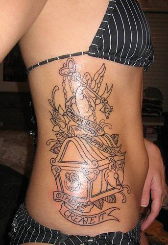 rib tattoo designs. girlfriend rib tattoo designs.