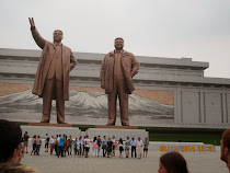 Massive 22 meter statues of Kim Il-sung and Kim Jong-il in front of Kimsusan Memorial Palace