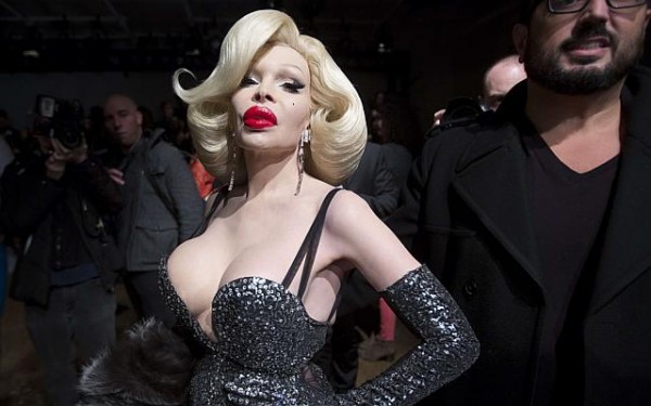 Amanda Lepore. Amanda Lepore, born Armand Lepore, is a famous American model, nightlife and fashion icon. She has served as a muse for photographer David LaChapelle's work, and is best remembered for appearing in advertisements for M.A.C Cosmetics and fashion brand Heatherette. She underwent gender reassignment surgery at age 19 in New York in 1989. In the 1990s, she established her career as a nightlife figure. Photo: Reuters